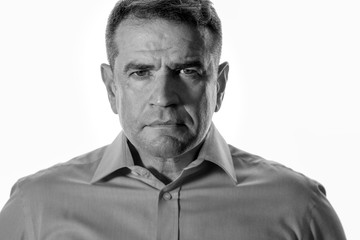 Black and white portrait of mature male wearing shirt