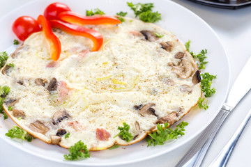 Delicious breakfast omelette with mushrooms