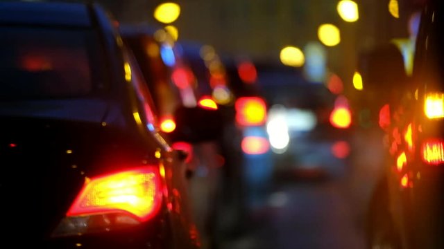 Traffic jam at big city back view blurred