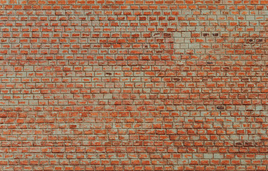 Naklejka premium Dirty red brick wall background