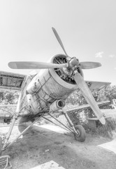 The Antonov An-2 a Soviet mass-produced single-engine biplane at an abandoned aerodrome