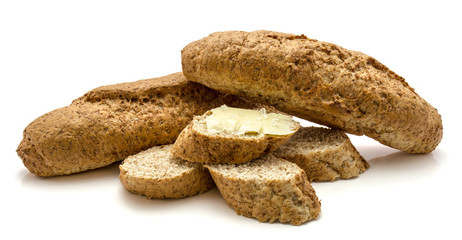 Two bagels and slices of whole wheat bran bread isolated on white background