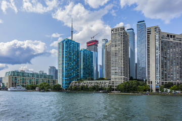 Fototapeta na wymiar The beautiful Toronto's skyline over lake. Urban architecture. Ontario, Canada.