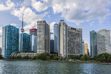 Fototapeta na wymiar The beautiful Toronto's skyline over lake. Urban architecture. Ontario, Canada.