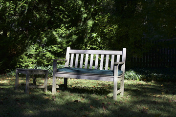 wooden garden bench in back yard