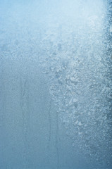 Fototapeta na wymiar Frozen window, winter background