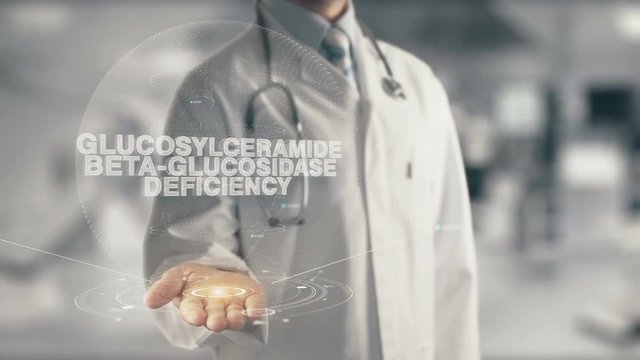 Doctor holding in hand Glucosylceramide Beta-glucosidase Deficiency