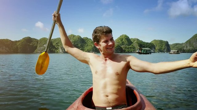 Joyful Man Makes Selfie Shakes Paddle Drifts in Kayak