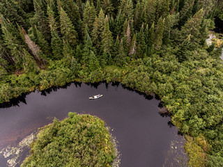 Wild Forest Canada aearial view kayak kayaking canoe canoeing boat river birds eye view veins...