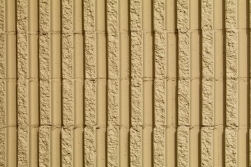 Vertical textured tan concrete