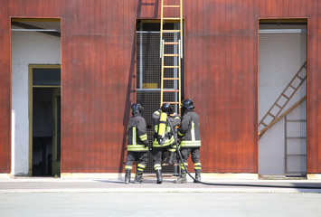 three firefighters in the fire brigade