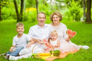 Fototapeta premium Senior woman reading book in library