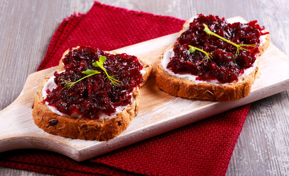 Beetroot relish over brown bread