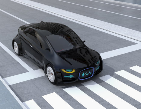 Black self-driving car's front grille showing digital signage for pedestrian. Concept for communication between autonomous car and pedestrian. 3D rendering image.