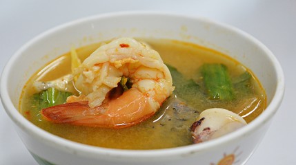Tom Yum Goong/Tom Yum Goong in white cup and white background focus on Shrimp,thai sea food