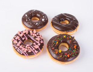 chocolate donuts on a white background