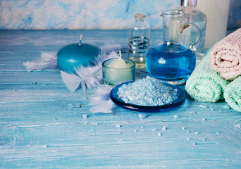 Set for spa with towels, salt and aromatic oils, selective focus