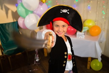 Boy pretending to be as pirate during birthday party