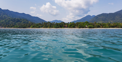 view of the tropical island from the sea