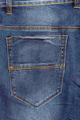 Fototapeta premium Back pocket of blue jeans.