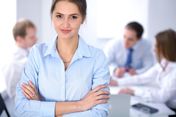 Beautiful business woman at meeting 