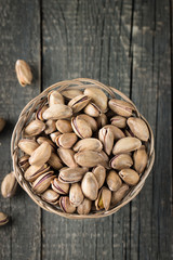 Healthy mix nuts on wooden background. Almonds, hazelnuts, cashews, peanuts, pistachios, brazilian nuts