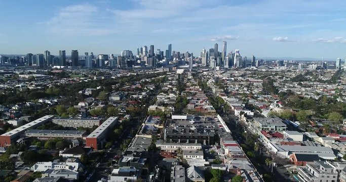 Melbourne city CBD on a sunny day above South Yarra roof tops from Port Melbourne.
