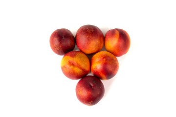 Nectarines triangle group on white background