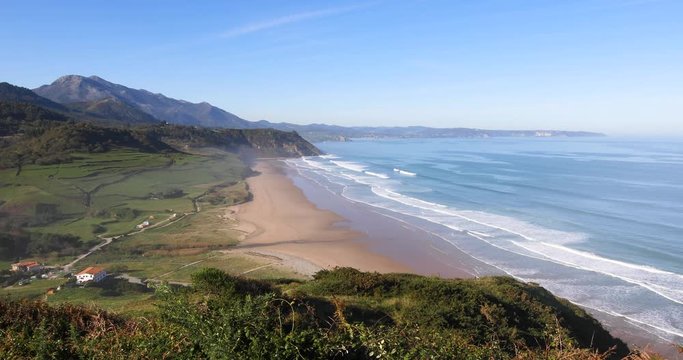 4k video. Landscape high shot view of beach named La Vega and Cantabrian Sea, in Ribadesella, Asturias Spain, Europe
