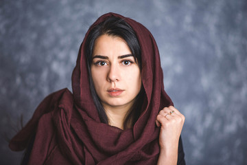 portrait of Arab women with long hair in a scarf - 178434765