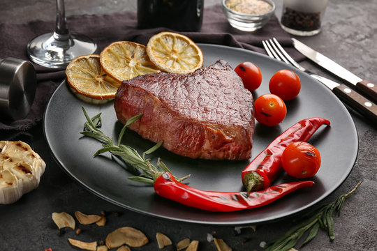 Plate with yummy steak closeup