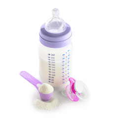 Baby milk formula and pacifier on white background