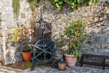 Fototapeta na wymiar Old wine press in the yard