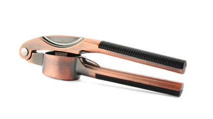 Metal garlic crusher on white background