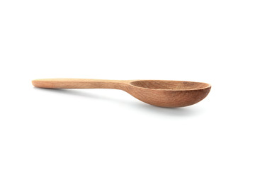 Wooden spoon on white background