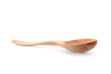Wooden spoon on white background