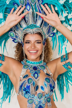 Beautiful brazilian samba dancer closeup portrait smiling and performing