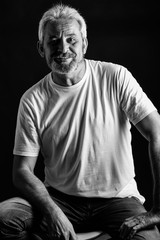 Fototapeta premium Mature man with white hair and beard smiling