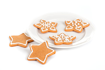 Christmas cookies with decoration /
Still life with decorated Christmas cookies in a plate isolated on white