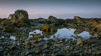 Rock pool at dawn near the beach at Cape Agulhas, South Africa