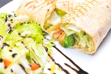 Tasty chicken tortilla wraps and salad