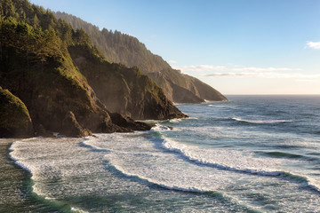 View from the Heceta Head lighthouse overlooking scenic Cape Cove on the Oregon pacific coast line.