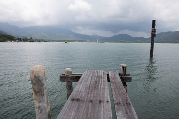 Wooden jetty on exotic beach Koh Chang island, Thailand