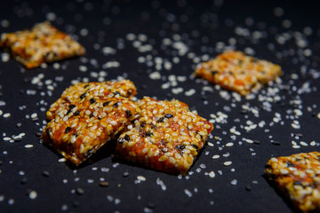 vegan cereal crackers on a black background
