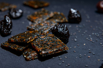 vegan cereal crackers on a black background
