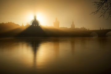 Fototapeta premium Sunrise view. Detail of church at Krizovnicke square. Sunlight over historical building, Prague, Czech republic