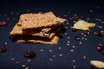 vegan cereal crackers on a black background
