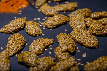 vegan cereal crackers on a black background