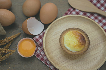 Top view,Egg tart on wood plate
