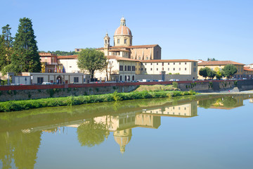 Fototapeta na wymiar View of the Church of San Ferdiano al Cestello from the Arno river. Florence, Italy